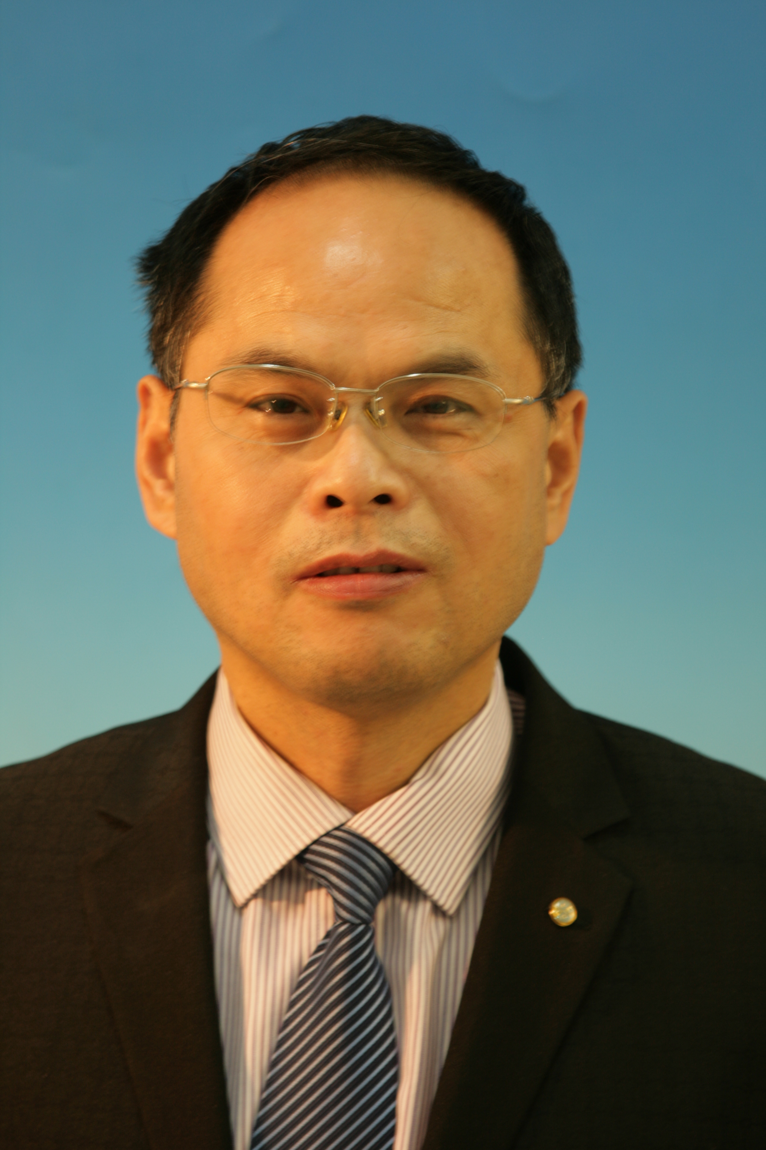 Dr. Xue-Qian Fang